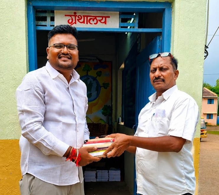 Books being donated at a village library